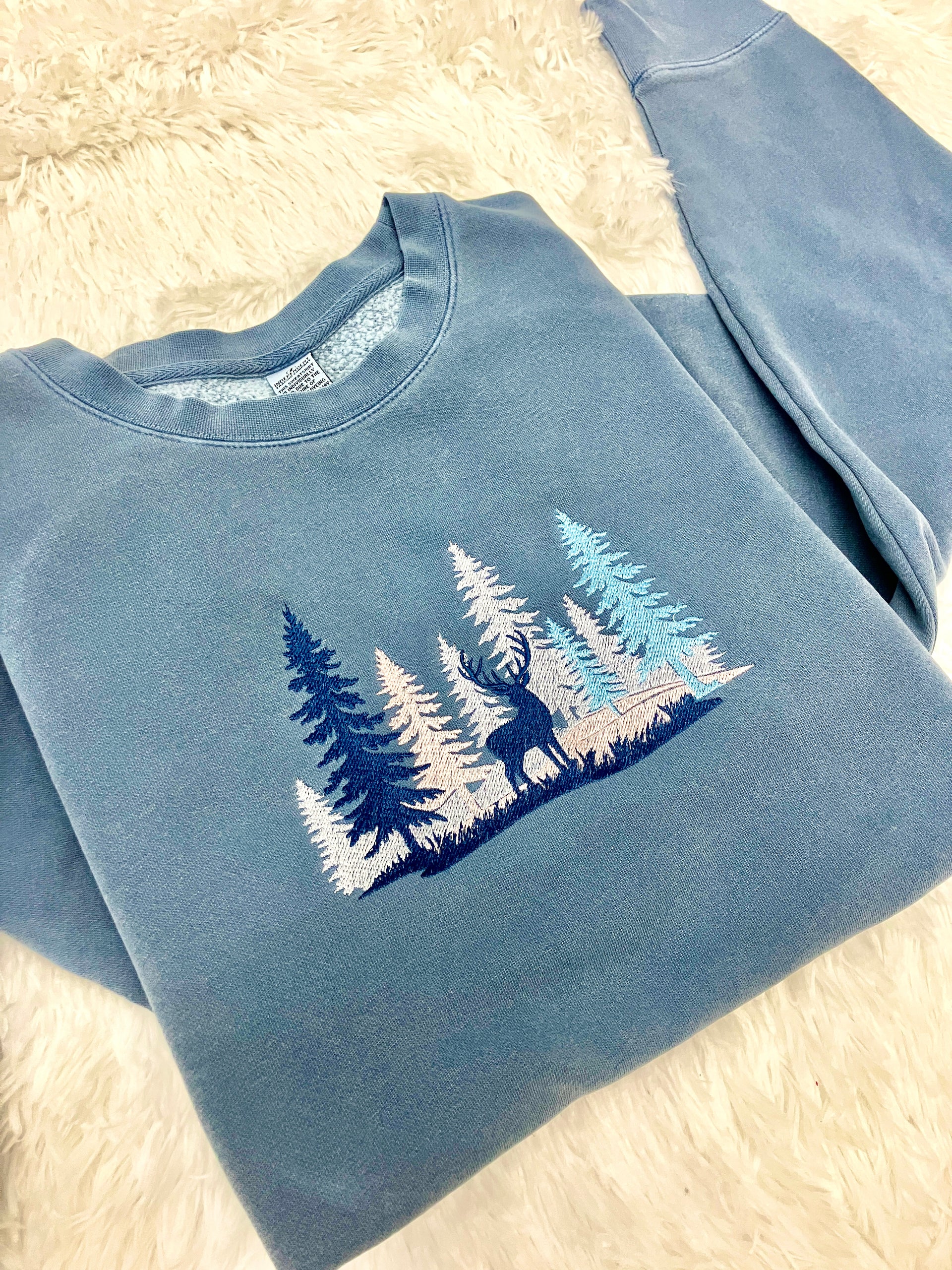 WINTER WONDERLAND BUCK EMBROIDERED SWEATSHIRT