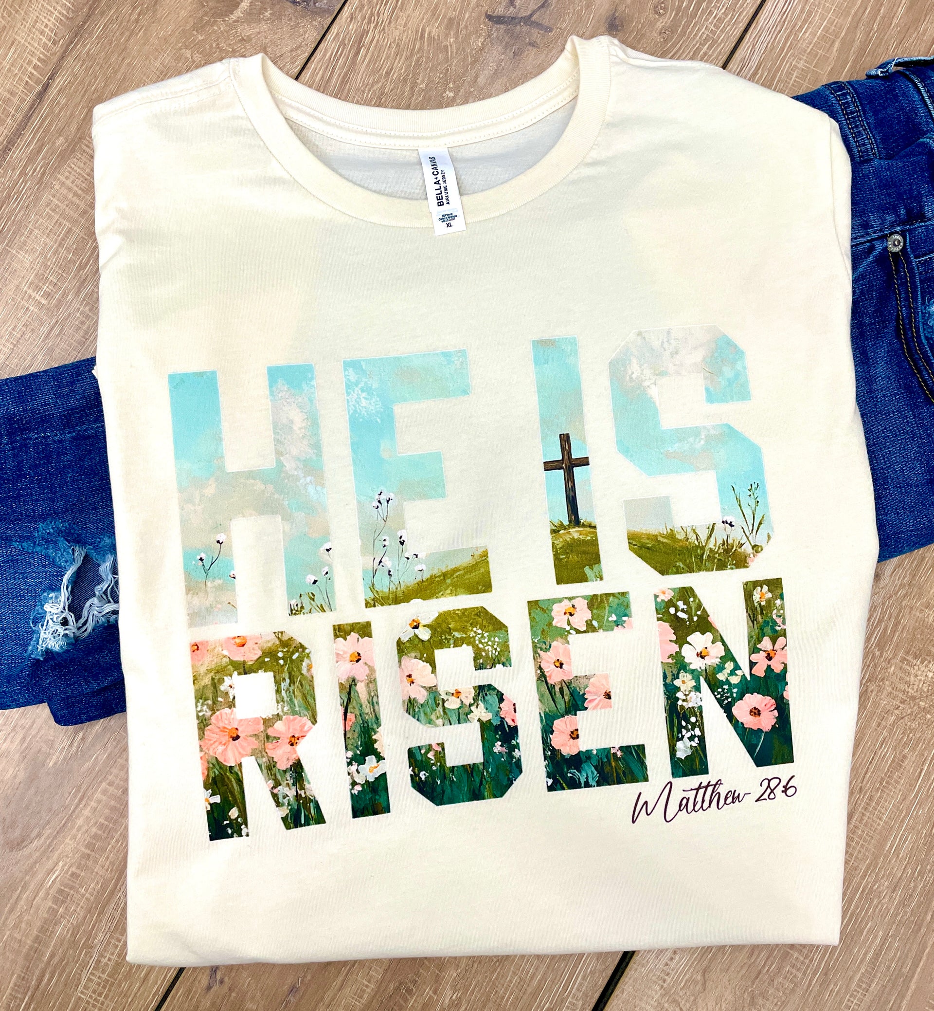 HE IS RISEN BLOCK TEXT TEE